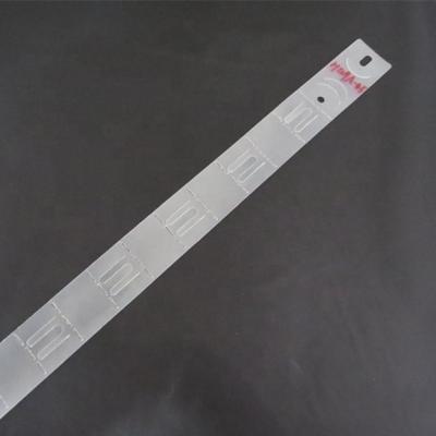 China Display Used In Supermarket Hot Sale Clear White Supermarket Display Clip Plastic Hanging Strip for sale