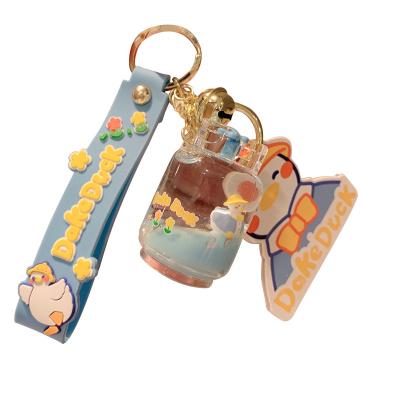 China S1201 cute animal doll in oil can lean quicksand cartoon key chain wholesale cute acrylic pendant doll key chain for sale