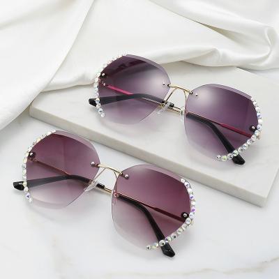 China New Fashion Rimless Cut Edge Diamond Sea Slice Sunglasses Ladies Sunglasses S1543 Fashion Korean Version Sunglasses for sale