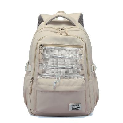 China Wholesale OEM letter anti-theft logo print large canvas backpack primary school bag travel backpack single zipper student for sale