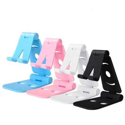 China New Phone Holder Tablet Stand Multifunctional Adjustable Foldable Plastic Desk Lazy Phone Holder for sale