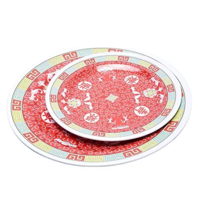 China Customed Sustainable Unbreakable 18 Inch Melamine Red Printing Round Plates Dinner Plate for sale