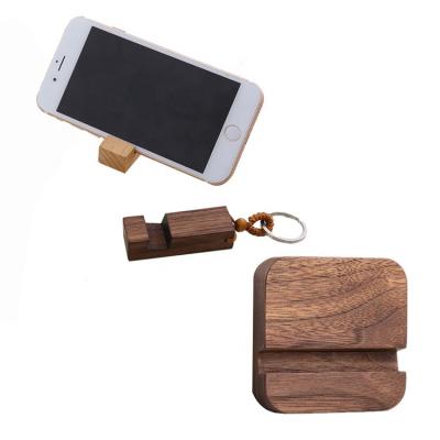 China Creative New Style Key Chain Adjustable Wooden Phone Stand Lazy Hanging Bracket Support Customization for sale