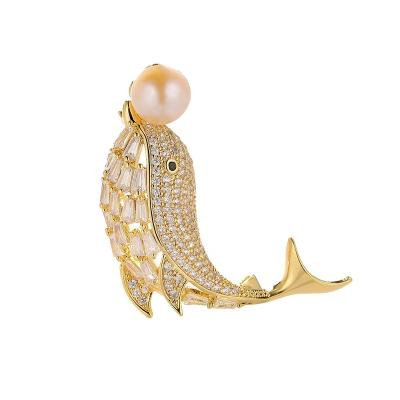 China Fashion Individualization Designer Jewelry 18K Gold Zircon Pearl Brooch Popular Luxury Custom Animal Dolphins Brooch Cooper For Women for sale