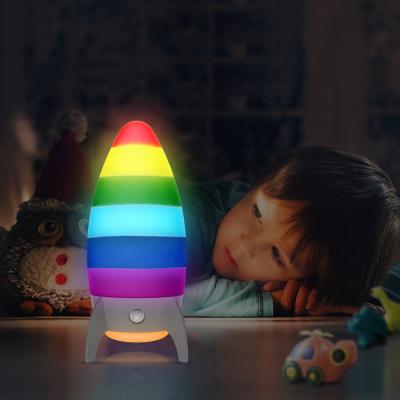 China Bedside Eco-friendly Plastic Color Table Decoration KH-NL079A Rocket Rainbow Motion Sensor Baby LED Night Changing Light For Kids for sale