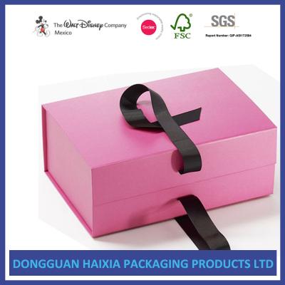 China Pink Covering Magnetic Foldable Box , Decorative Gift Boxes With Ribbon Closure for sale