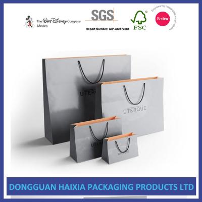 China Customized Logo Printing Kraft Paper Shopping Bags Highly Durable For Promotion for sale