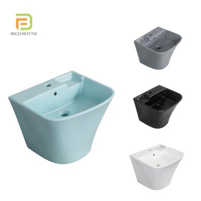 China Modern Luxury Modern Bathroom Ceramic Quick Sink Wall Mounted Hung Basin Sink Wall Delivery Style Blue Color Wash Basin for sale