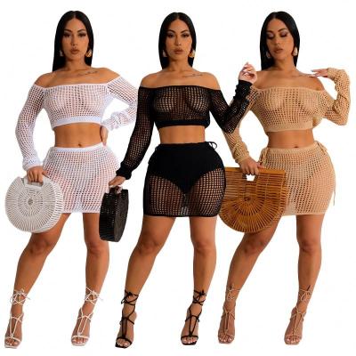 China QUICK DRY 2023 New Arrival Crocheted Two Piece Skirt Sets Women Clothing Hollow out Bodycon Solid 2 Piece Skirt Suit Set for Women for sale