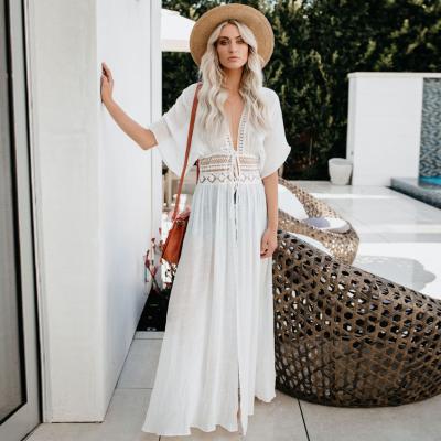 China Summer Breathable Women Fashion Beach Dress Hollow Lady Cute Knitted Overall Long Dress Short Sleeve Crochet Translucent Cardigan Dress for sale