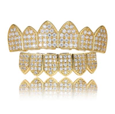 China Non-erasing gold set slightly inlaid teeth for cutting edge vampire teeth hip hop accessories with gold teeth for sale