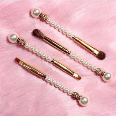 China Luxurious Creative Pearl Handle 4Pcs Experience Cosmetic Set Brush For Women Makeup for sale