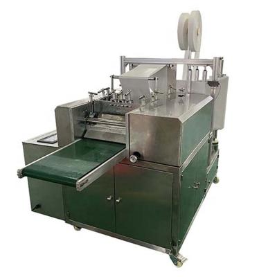 China Full Automatic China Supplier Wooden Alcohol Swab Pad Making Packing Machine With 4 Lanes for sale