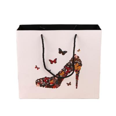 China Security Packaging Luxury Custom Printing Soft Touching Gift Bag With Butterfly for sale