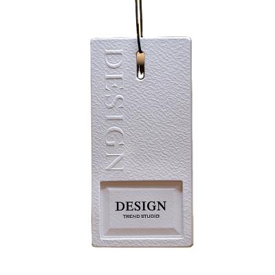 China Sustainable Custom Embossed Recycled Logo Paper Card Garment Tags Hang Tag Paper Clothing for sale