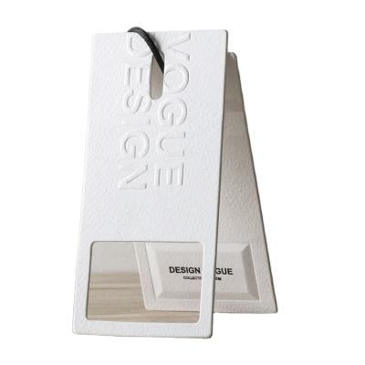 China Viable custom die-cut garment tags 2021 new clothing designs logo tag garment pants for sale