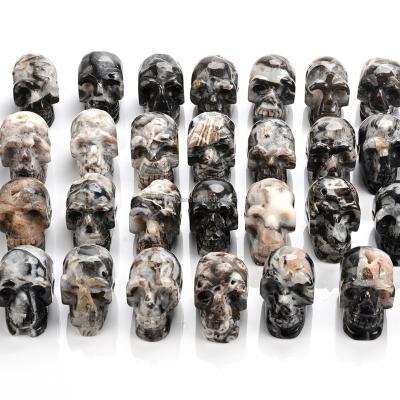 China Europe 2 Inch Realistic Hand Carved Natural Stone Crystal Sphalerite Skulls For Crystal Quartz Healing Skull Keepsake for sale