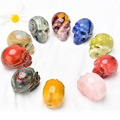 China Europe Wholesale High Quality 2.0 Inch Gemstone Skulls Hollow Carved Crystal Skulls Healing Crystal Skulls for sale