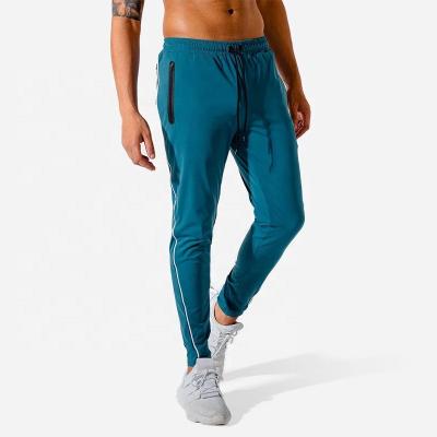 China Custom Outdoor Sports Side Gym Zipper Pocket Anti-wrinkle Polyester Jogger Running Pants for sale