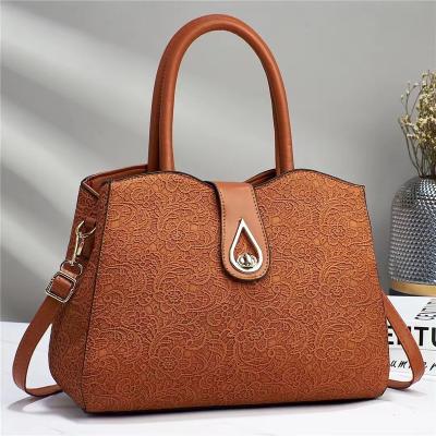 China High Quallity 2024 New Solid Color Simple Leather Textured Embroidered Large Capacity Handbags For Women Bags for sale