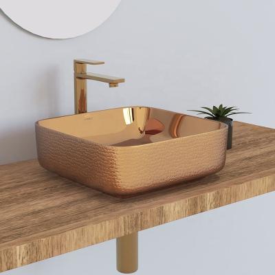 China Modern Fashion Bathroom Sink Square Rose Gold Color Sink Wash Ceramic Basin For Countertop for sale