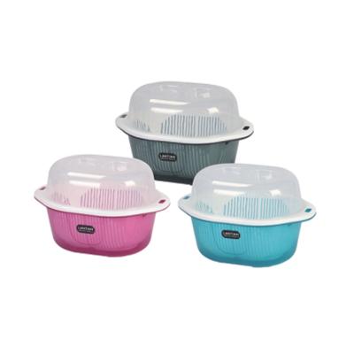 China Traditional Kitchenware Plastic Strainer Drainning Basket With Cover Oval Shape for sale