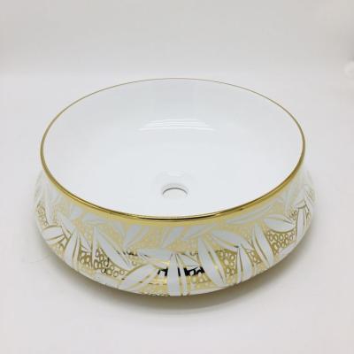 China Modern European Standard Sanitary Ware Customized Ceramic Art Hand Wash Basin Bathroom Oval Gold Color Ceramic Sinks for sale