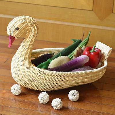 China Huangtu Sustainable Goose Rattan Basket Animal Shape Fruit And Vegetable Food Storage Basket for sale