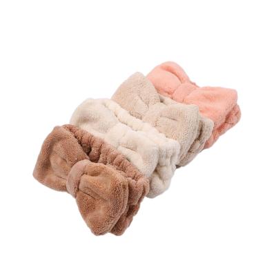 China Soft Elastic Bowknot Hairband Makeup Spa Terry Towel Custom Logo Hairband Fluffy Towel for sale