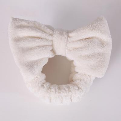 China Profession Design Soft Bowknot Women Beauty Headbands To Make Up Shower Spa Hair Band for sale