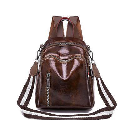 China 2021 Hot Selling Stylish Faux Leather School Backpack Bag Waterproof Leather Women Backpack Wholesale for sale