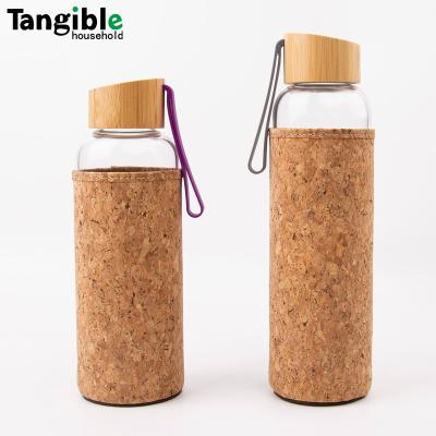 China WITH LID 22oz Portable Clear Glass Water Bottle BPA Free Borosilicate Glass Drinking With Cork And Bamboo Cover Lid for sale