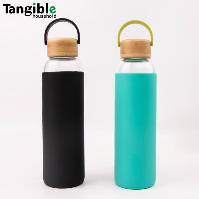 China WITH LID Gym Portable Water Bottle Portable Glass Drinking Water Bottle with Silicone and Bamboo Sleeve Lid for Hot Cold Drinks for sale