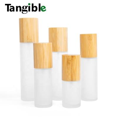 China Cosmetic Cosmetics Packaging Frosted Mist Spray Glass Bottle With Bamboo Cap 30ml 50ml 60ml 80ml 100ml 120ml Olive Oil Glass Bottle for sale