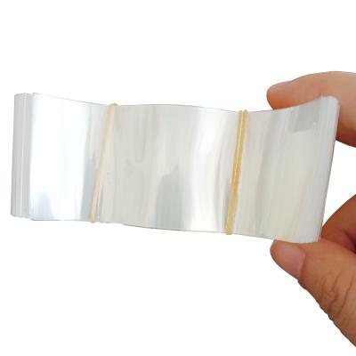 China High Light Weight Heat Sensitive Packaging Plastic Film Whole Seal With Tear Line Heat Shrink Wrap For Bottle Or Tube for sale