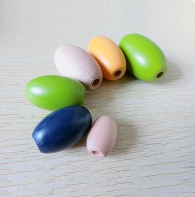 China Wood Colored Oval Wooden Beads Wooden Loose Bead for sale