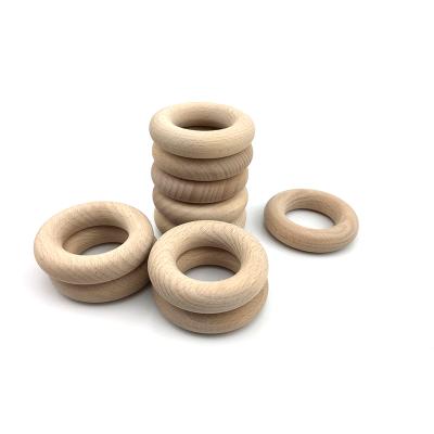 China 65x13mm Eco-friendly Beech Wooden Teether Ring - High Quality Smooth Surface for sale