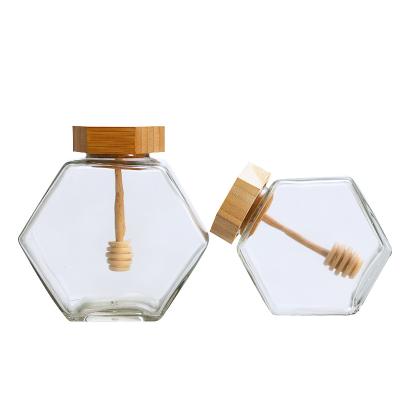 China Freshness Preservation Empty Hexagon Bee Shaped Honey Jar With Wooden Plunger Lid Packing Box Bulk 100ml 200ml 500g for sale