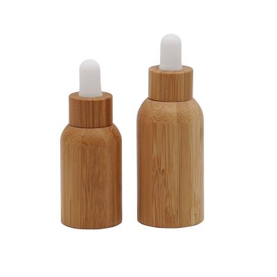 China Essential oil cosmetic 15ml essential oil bottles bamboo bottles with bamboo dropper for sale