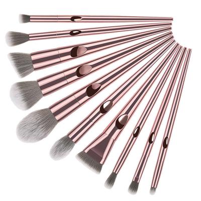 China Angular Blush New Design 10pcs Laser Powder Makeup Brush Thumb Stick Powder Stick Makeup Brush OEM for sale