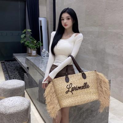 China Low moq fashion wheat straw handbag with raffia decoration handbag with handles ladies leather handbag for sale