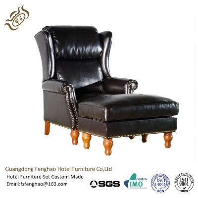 China Schwarzer lederner Klubsessel mit Osmane-Holz-/Metallrahmen Wingback zu verkaufen