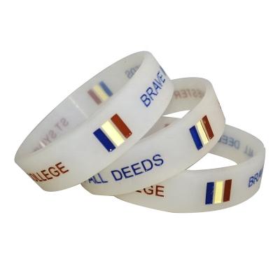 China All Carving Wrist Band debossed fill  Custom Logo  Promotion  Ink Injected Photosensitive Silicone Wristband Rubber Bracelet for sale