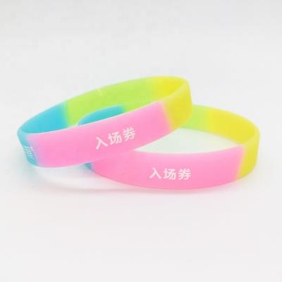 China All Colorful Ink Injected print embossed glow Custom Logo  Rubber Wristband debossed fill  Silicone bracelet Rainbow Seg for sale