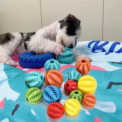 China Pet Dog Rubber Treat Dispensing Ball Hiding Food Puzzle Bite Interactive Pet Ball Chew for sale