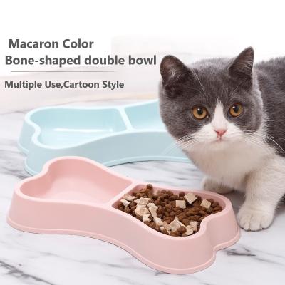 China Cuencos para mascotas Alimentadores sostenibles de color de macarrón forma de hueso Cuenco de comida doble para perros y gatos en venta