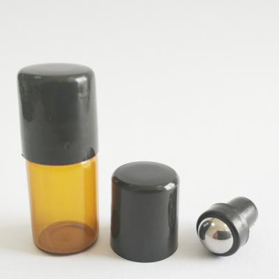 China Personal Care 5/8 Dram Sample Vial Amber Glass Roller Vials With Stainless Steel Roller Tops And Black Cap for sale