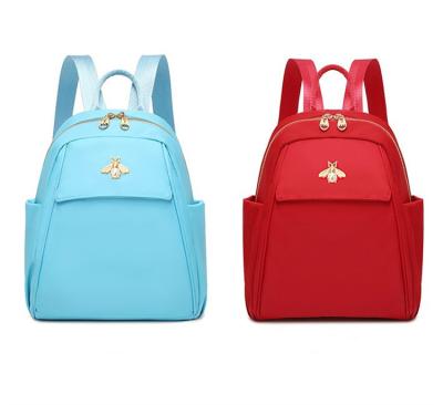 China Party Leisure Travel Oxford Waterproof Fabric Small Waterproof Shopping Backpack For Women for sale