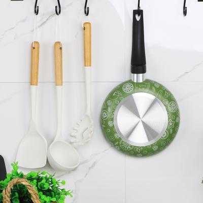 China Sustainable Cute Nonstick Aluminum Bottom Handle Bakelite Flat Frying Pan for sale