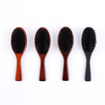 China Newest custom waterproof cushion natural black oak wooden detangling hair brush with pure boar bristles for sale